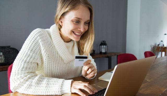 woman looking at computer